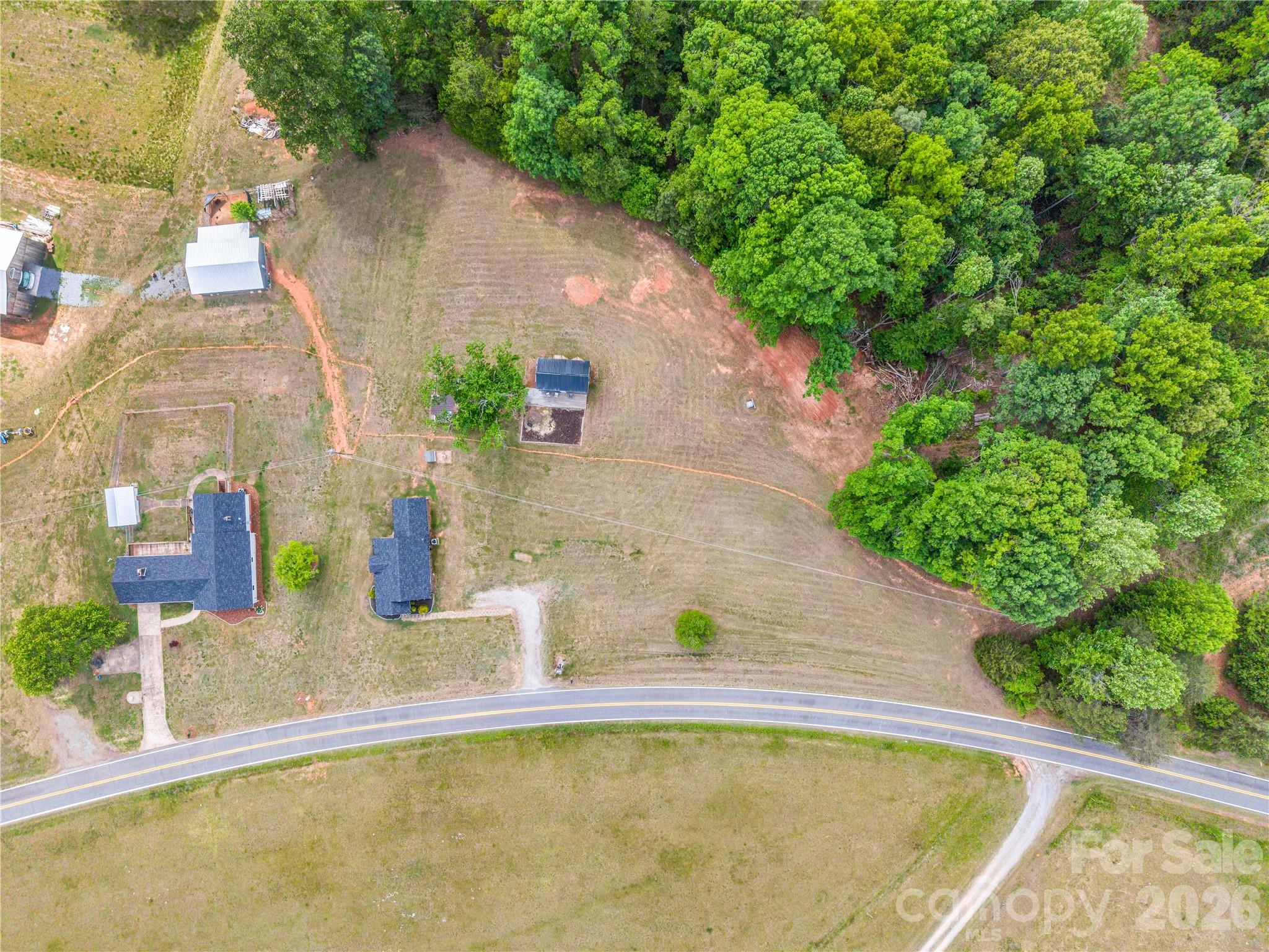 755 Depriest Road Bostic, NC 28018 - Photo 37 of 38 a view of a swimming pool with a patio