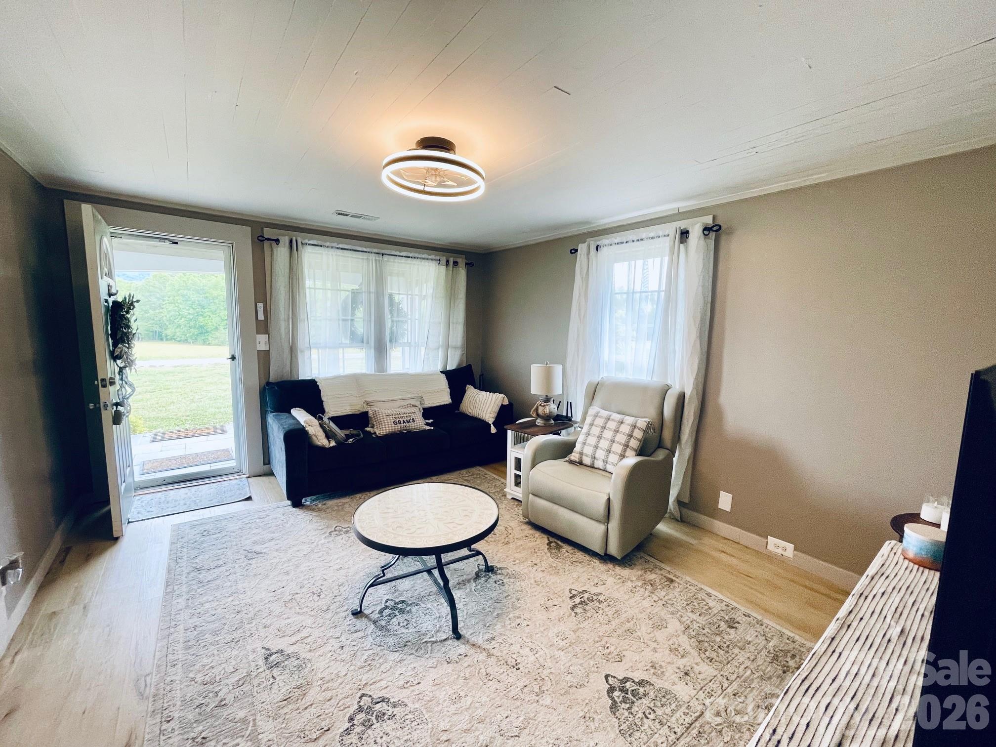 755 Depriest Road Bostic, NC 28018 - Photo 5 of 38 a living room with furniture and a large window