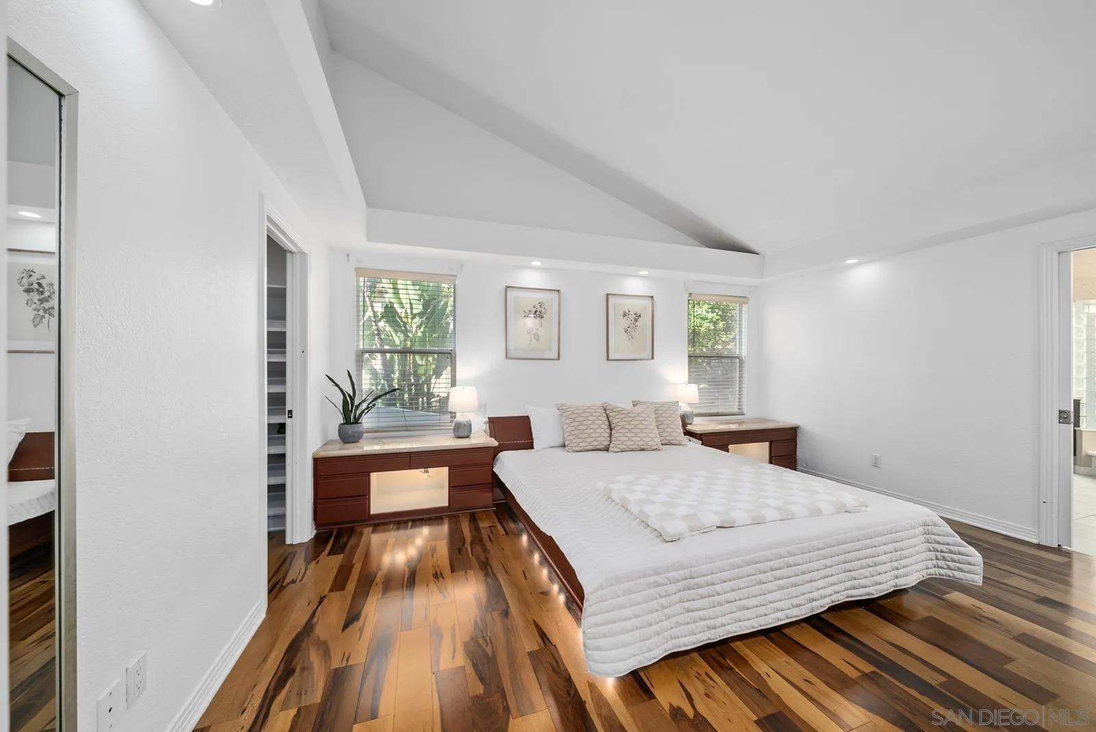 18695 Polvera Drive San Diego, CA 92128 - Photo 13 of 33 a bedroom with a bed and a large window