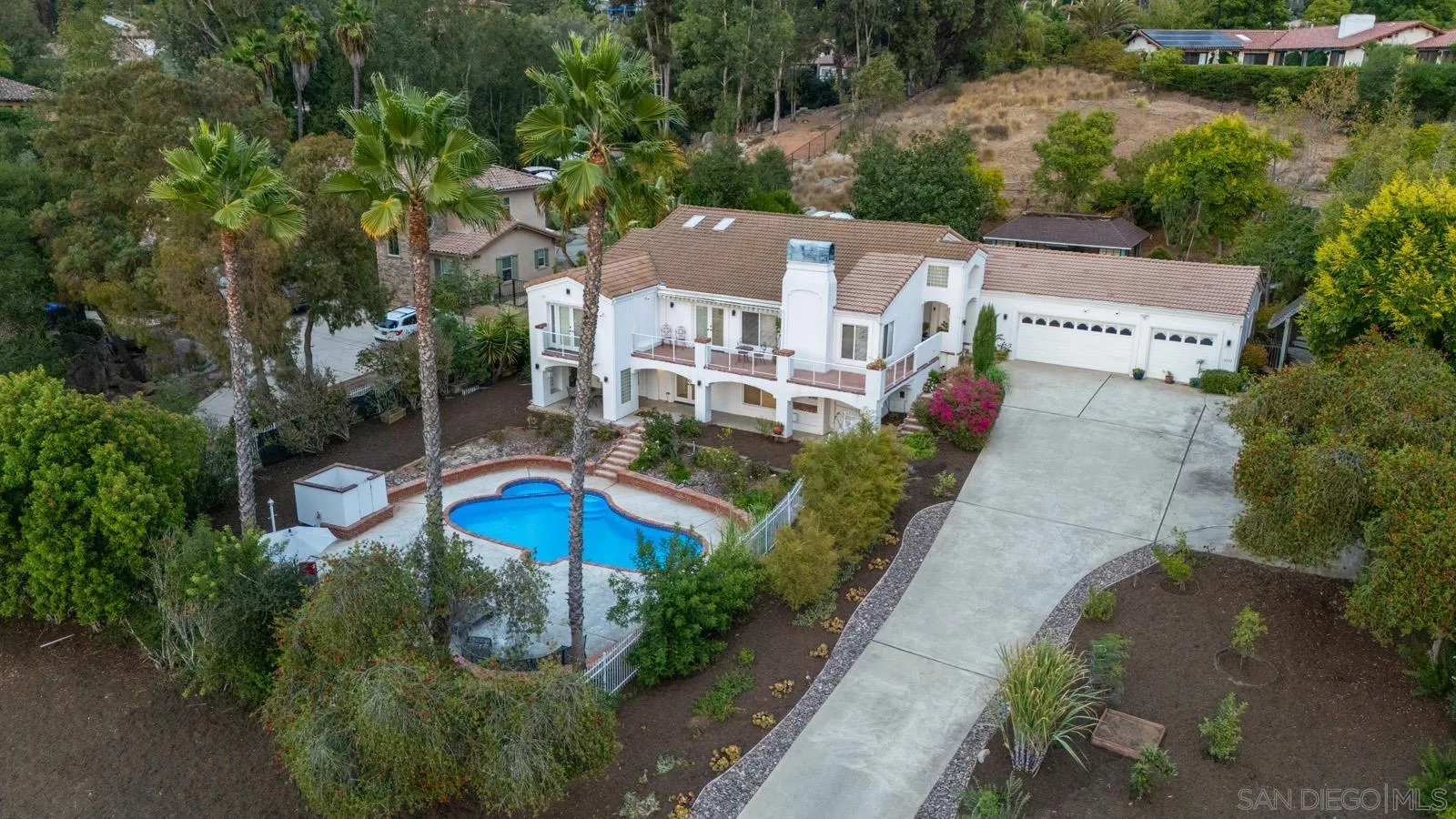 18695 Polvera Drive San Diego, CA 92128 - Photo 26 of 33 an aerial view of a house with a garden