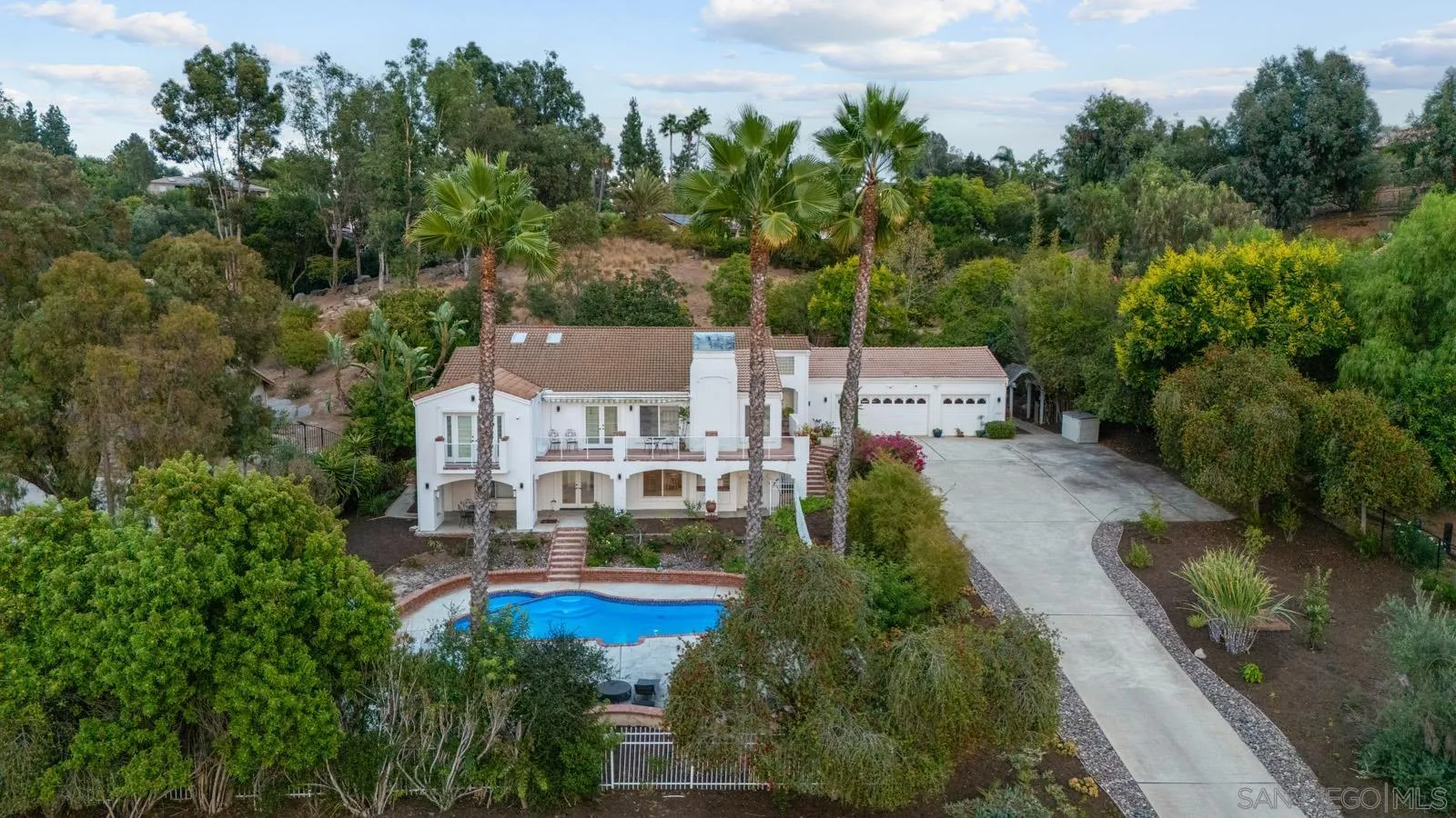 18695 Polvera Drive San Diego, CA 92128 - Photo 27 of 33 a view of a house with a yard