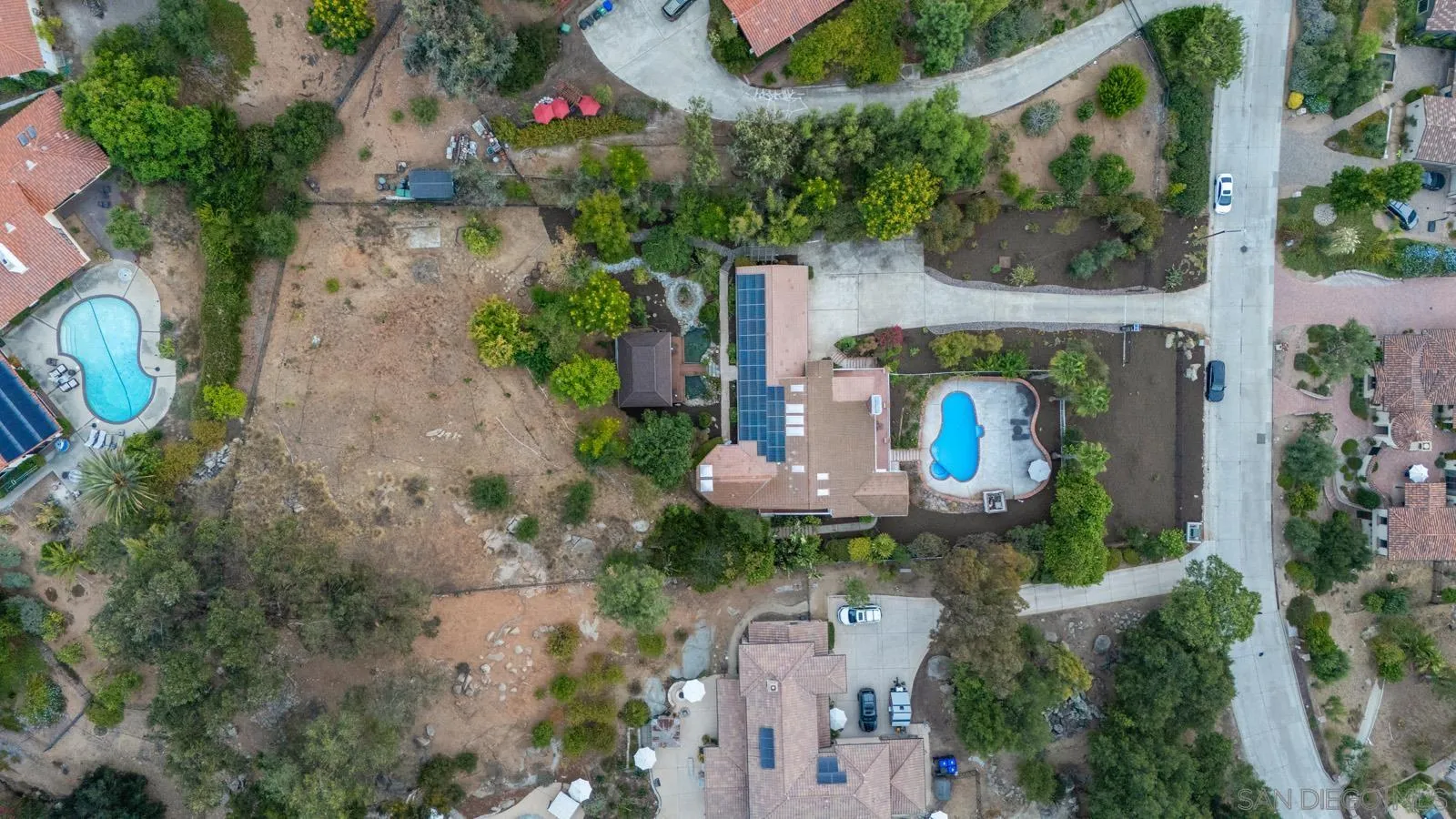 18695 Polvera Drive San Diego, CA 92128 - Photo 28 of 33 an aerial view of a house with garden space and street view