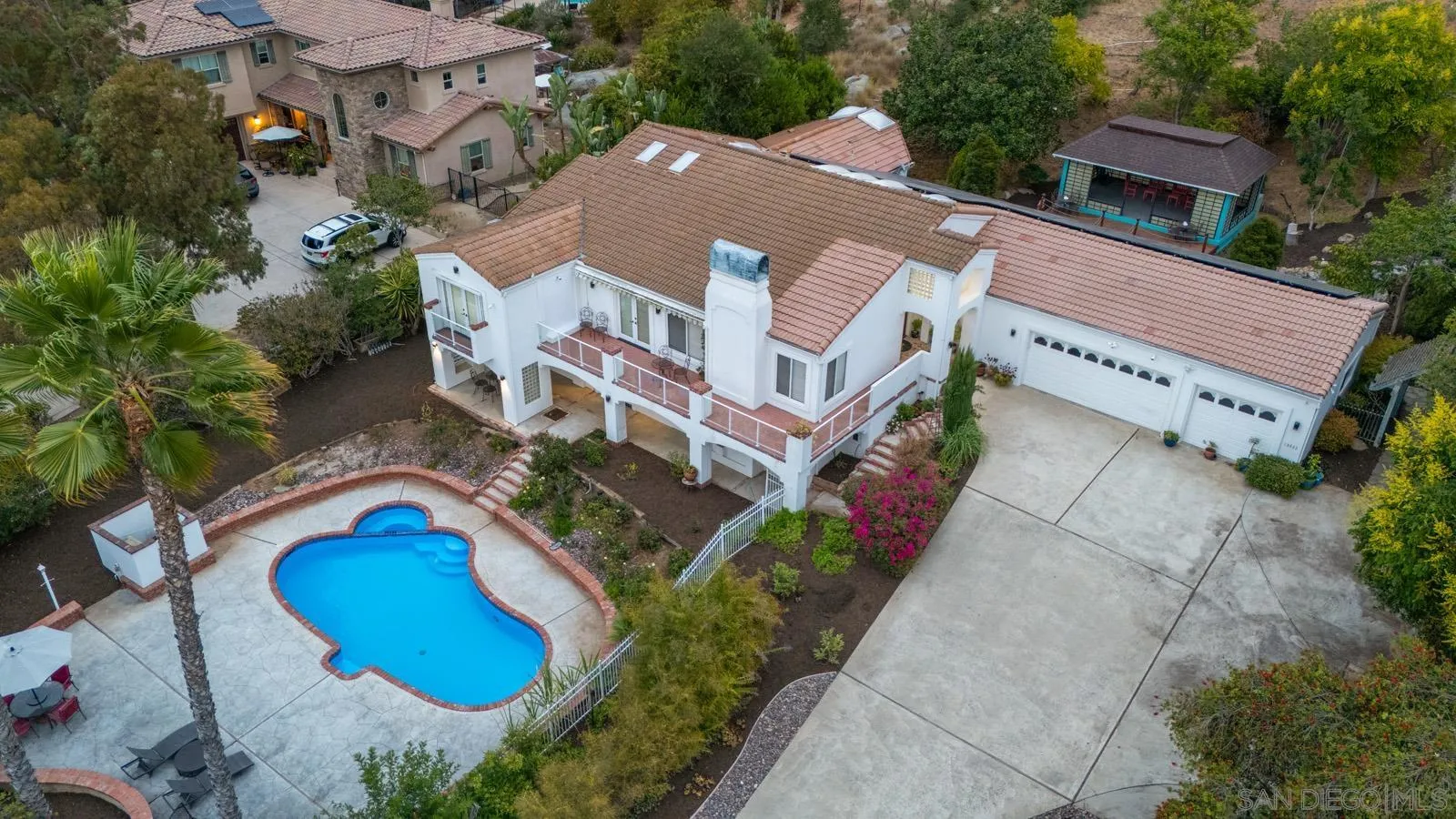 18695 Polvera Drive San Diego, CA 92128 - Photo 29 of 33 an aerial view of residential houses with outdoor space and parking