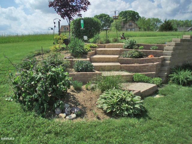 5 Beacon Trail Galena, IL 61036 - Photo 24 of 25 a view of a garden with a fountain
