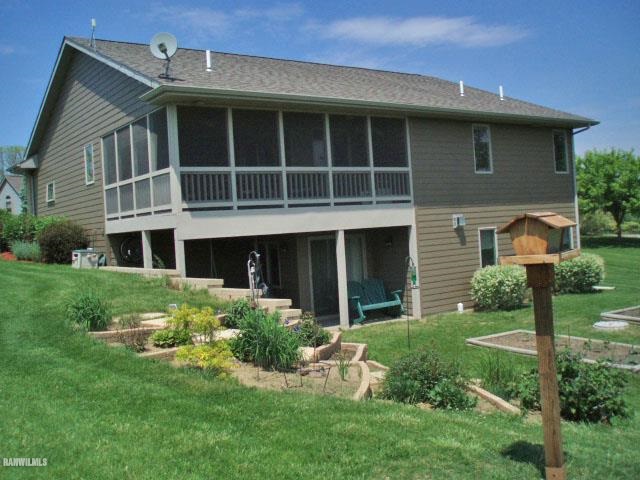 5 Beacon Trail Galena, IL 61036 - Photo 25 of 25 a front view of a house with a yard