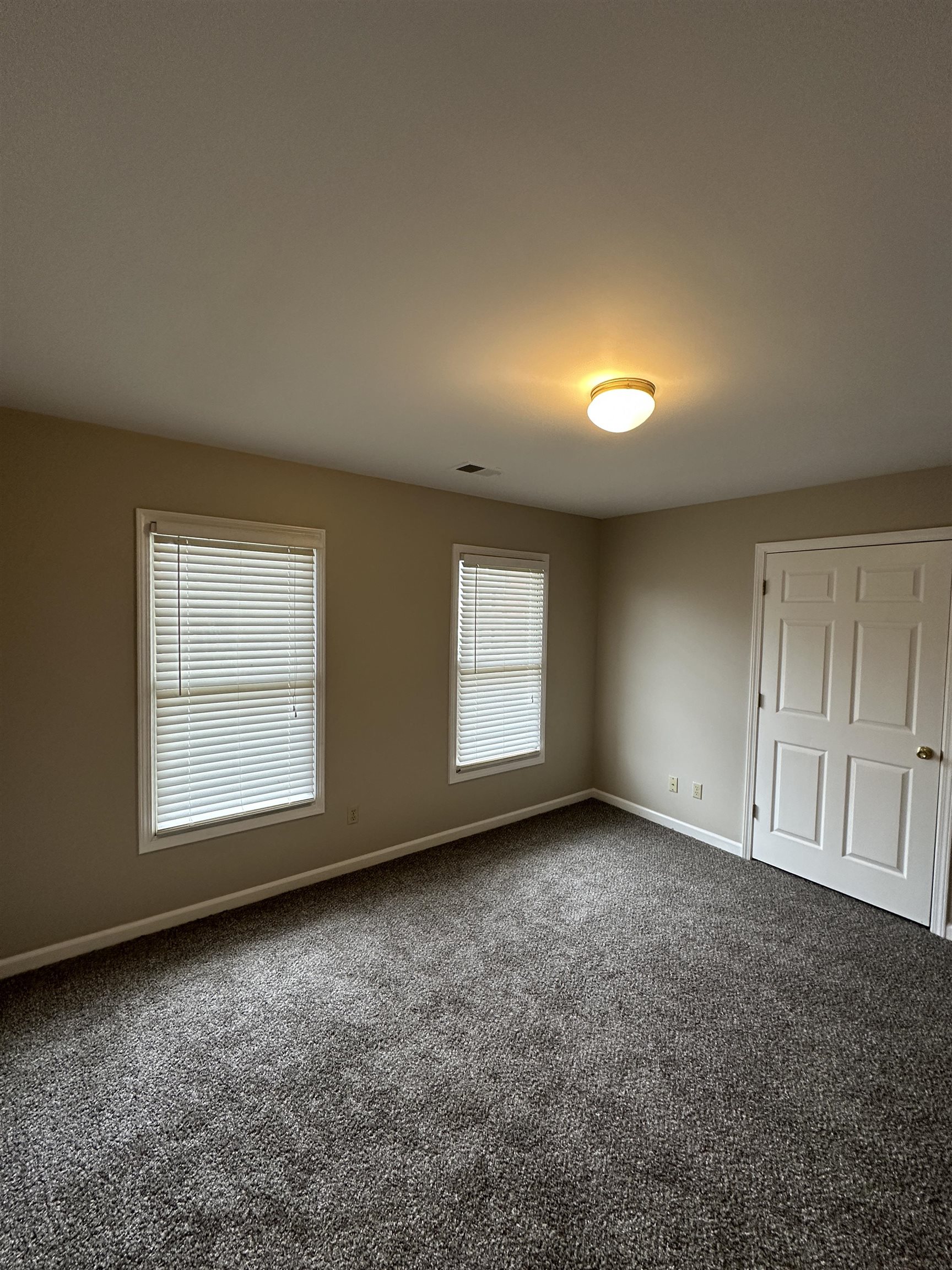 1959 Dartford Cove Memphis, TN 38016 - Photo 16 of 25 an empty room with a window