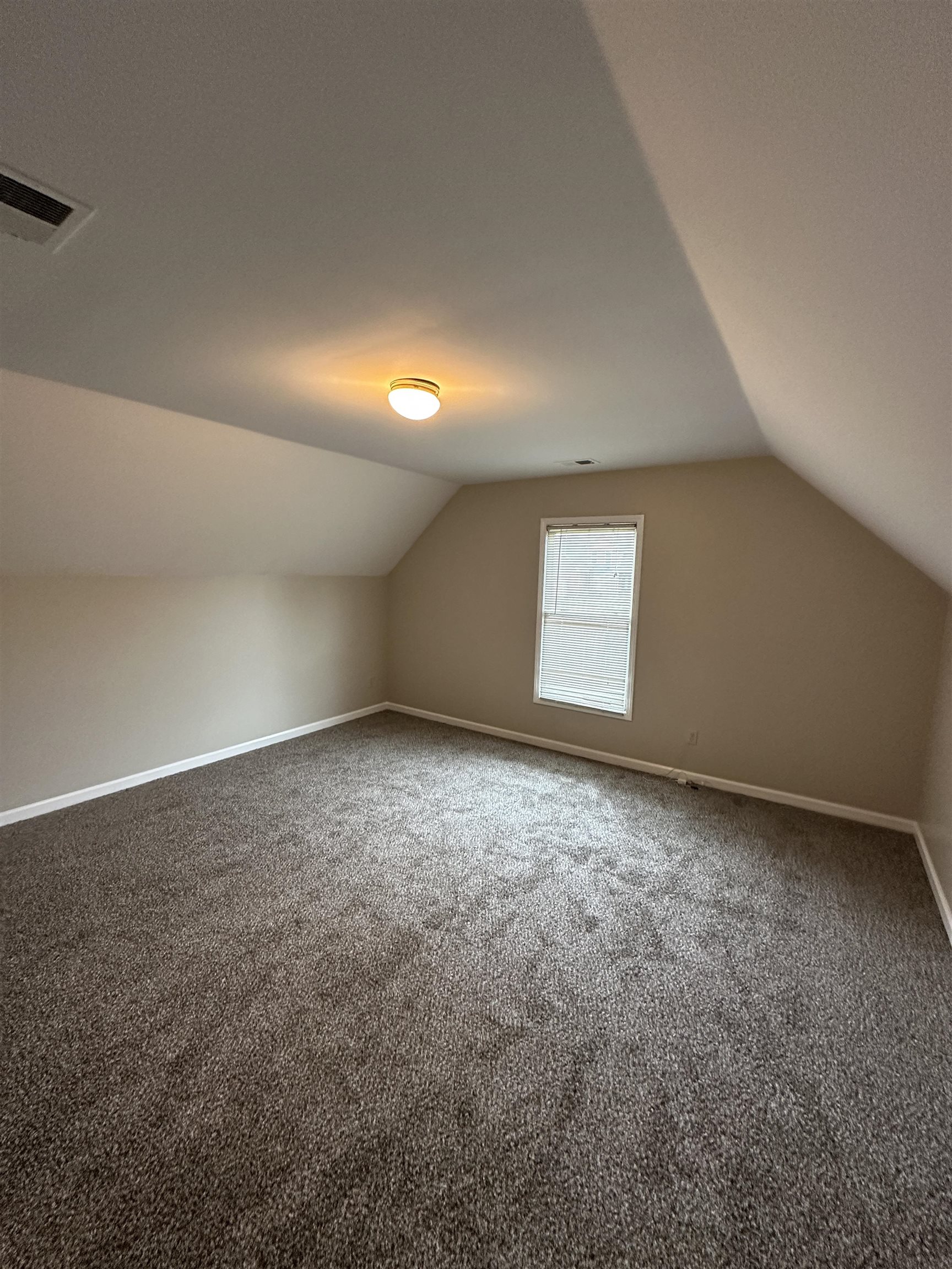 1959 Dartford Cove Memphis, TN 38016 - Photo 18 of 25 an empty room with a empty space and window