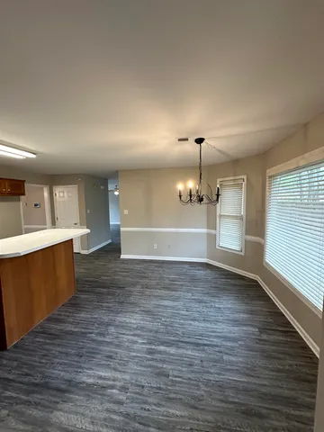 a view of a kitchen with a sink and dishwasher kitchen view