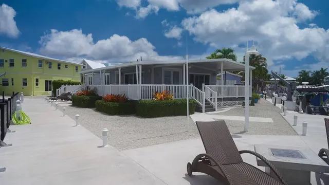 a view of an chairs and tables in the patio
