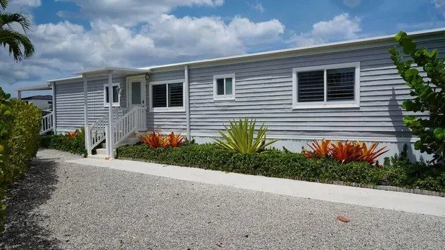a front view of house with a yard