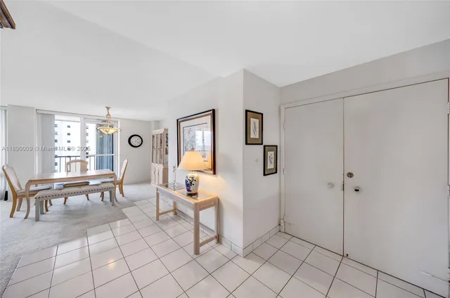 a view of a livingroom with furniture and a window