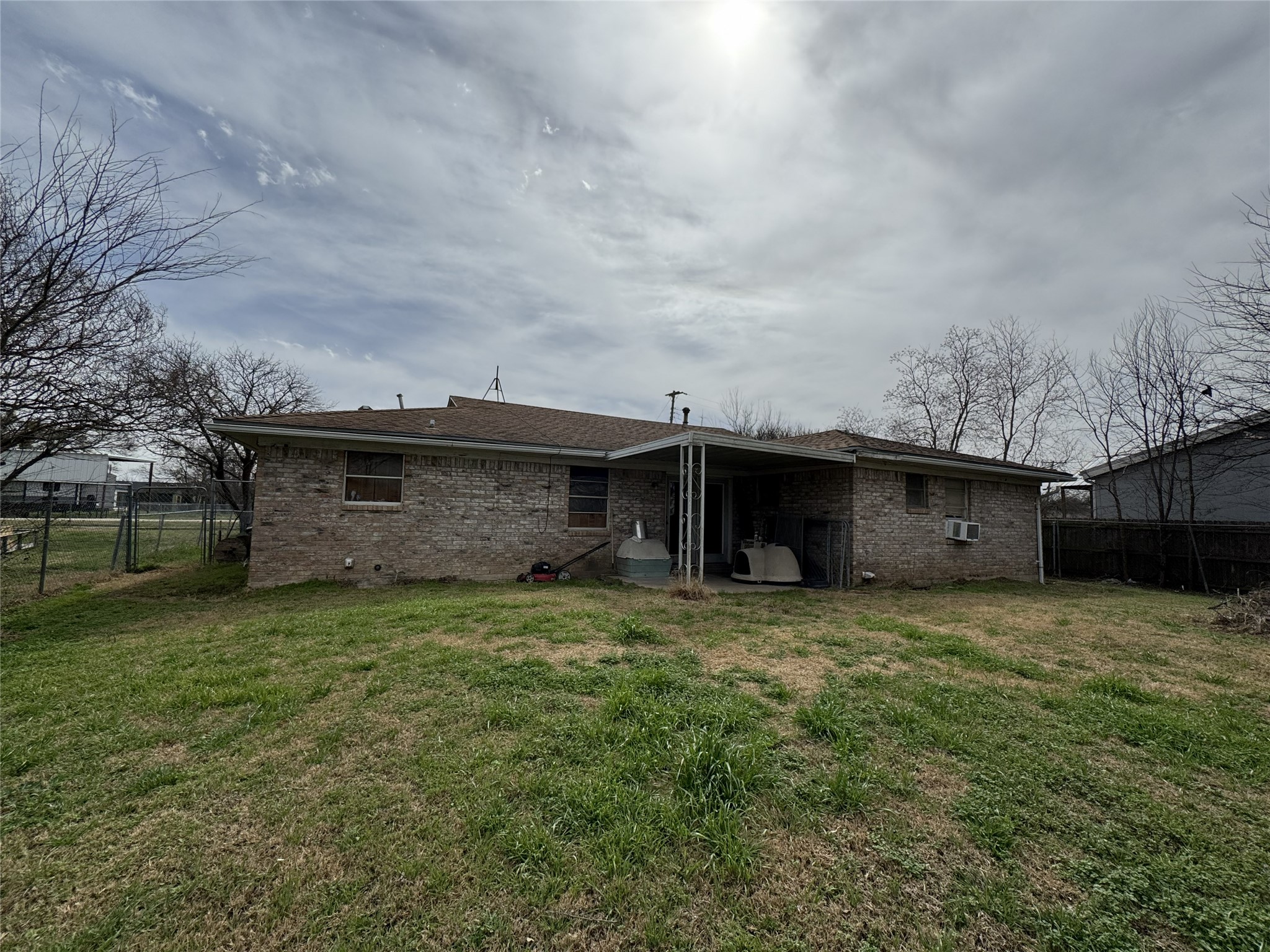 106 North 7th Street Dawson, TX 76639 - Photo 25 of 28 Rear view of property with brick siding and a patio