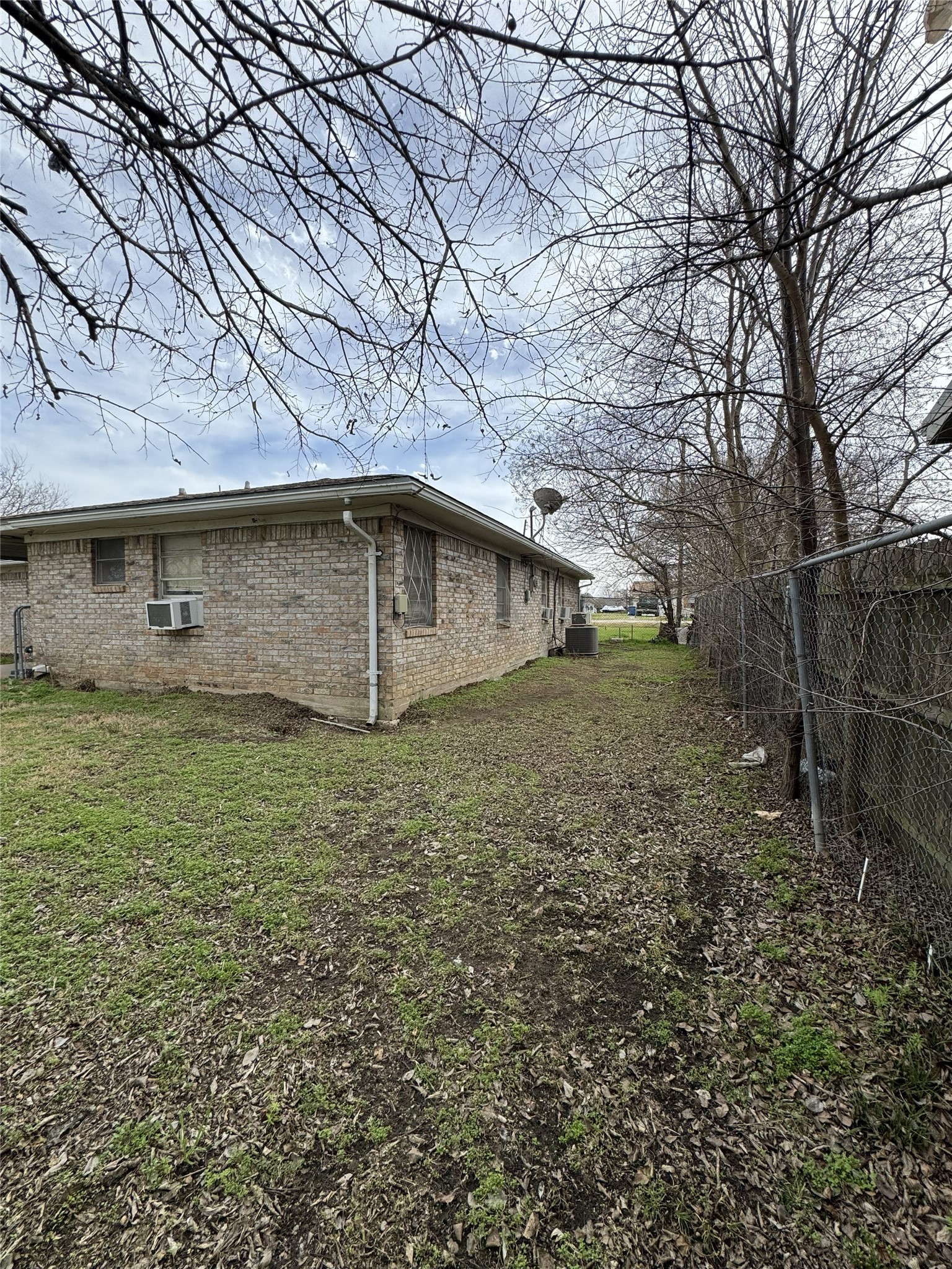 106 North 7th Street Dawson, TX 76639 - Photo 27 of 28 View of home's exterior with brick siding