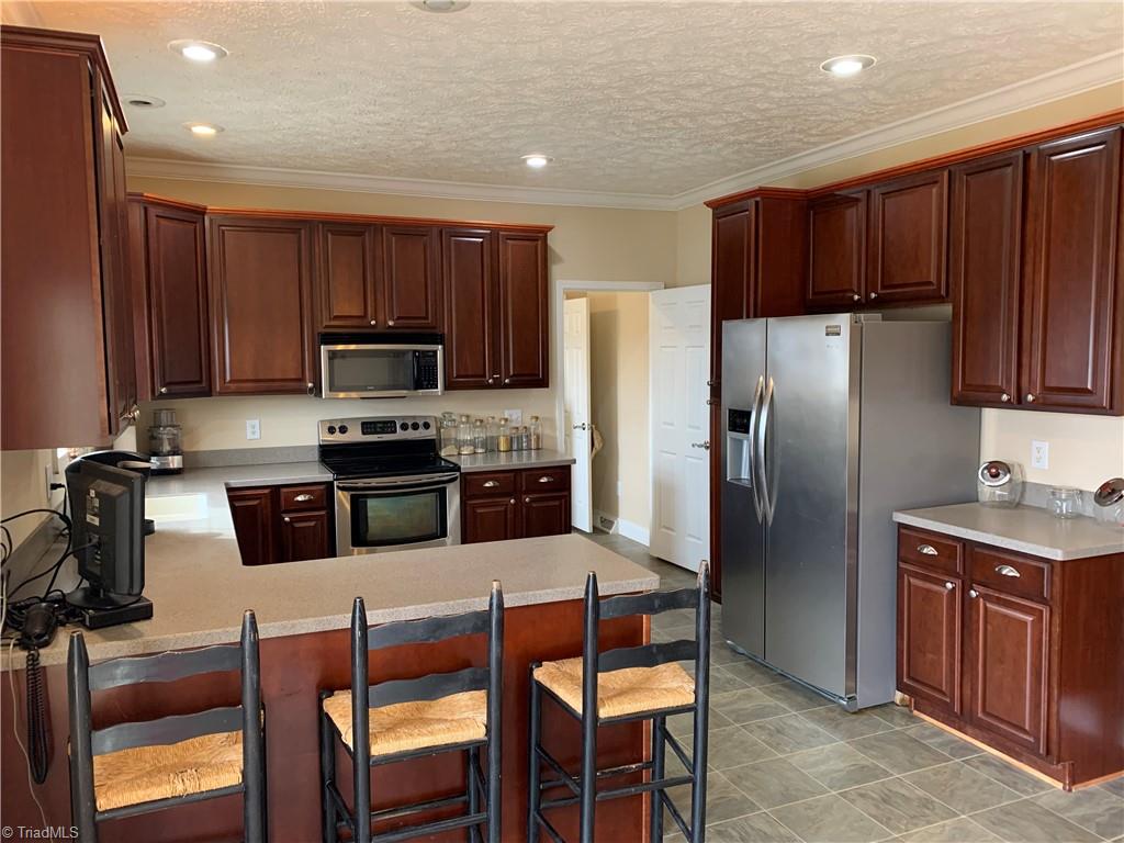 5717 Friendship Circle Road East Bend, NC 27018 - Photo 4 of 34 Gallery Image 4