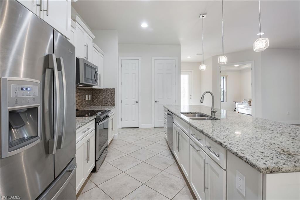 9074 Triangle Palms Lane Fort Myers, FL 33913 - Photo 9 of 22
