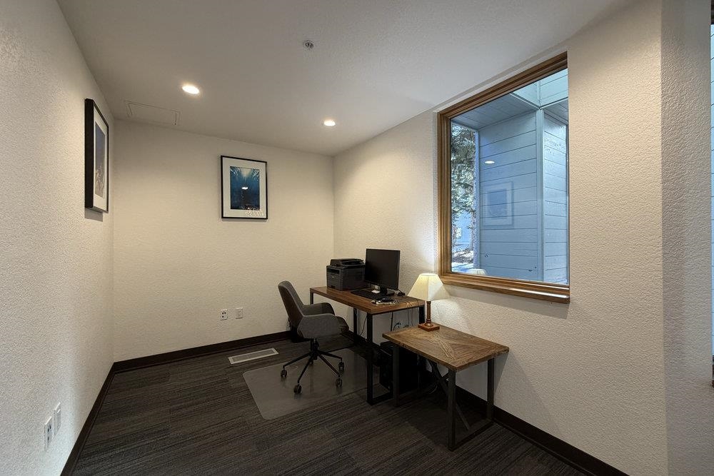 201 Shirley Cyn Road, Unit 233 Olympic Valley, CA 96146 - Photo 25 of 27 a view of a workspace with furniture and a window
