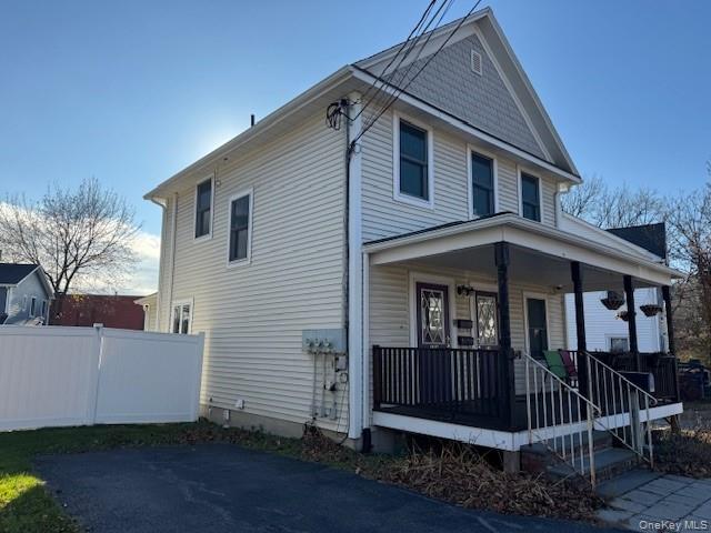 17 A Wheeler Avenue, Unit 17A Warwick, NY 10990 - Photo 2 of 18 a front view of a house with a yard