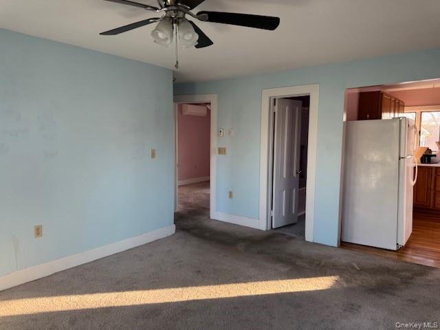 17 A Wheeler Avenue, Unit 17A Warwick, NY 10990 - Photo 5 of 18 a view of a livingroom with a ceiling fan and refrigerator