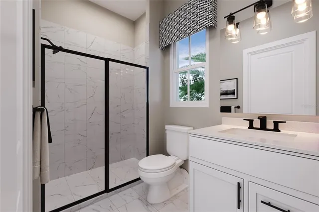 a large bed sitting in a bedroom next to a window