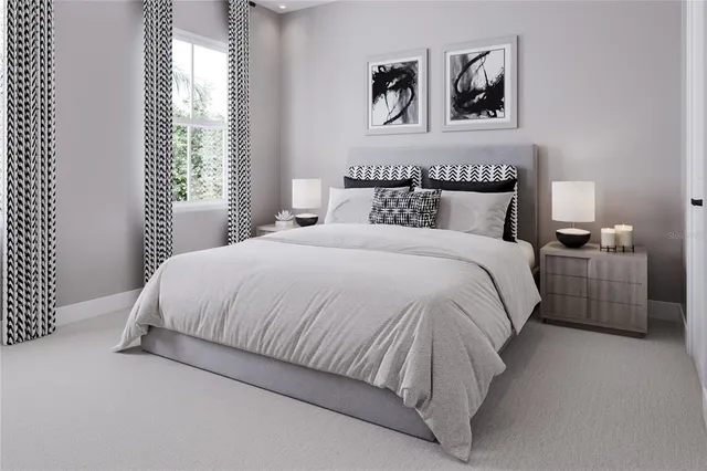 a bedroom with a bed and a large mirror