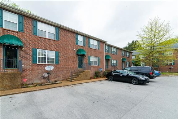 a car parked in front of a building