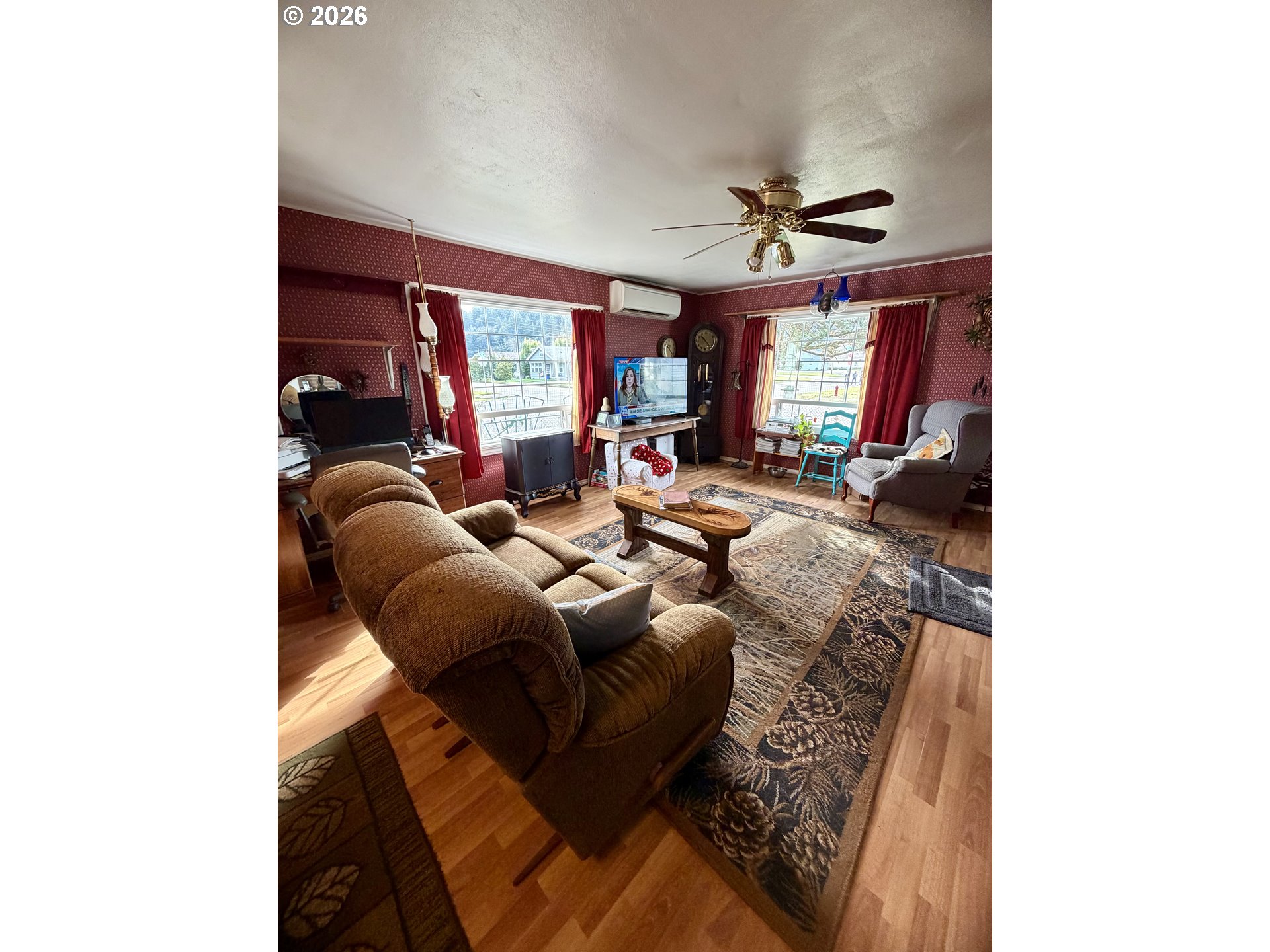 1009 Fir Avenue Reedsport, OR 97467 - Photo 4 of 16 a living room with furniture and a large window