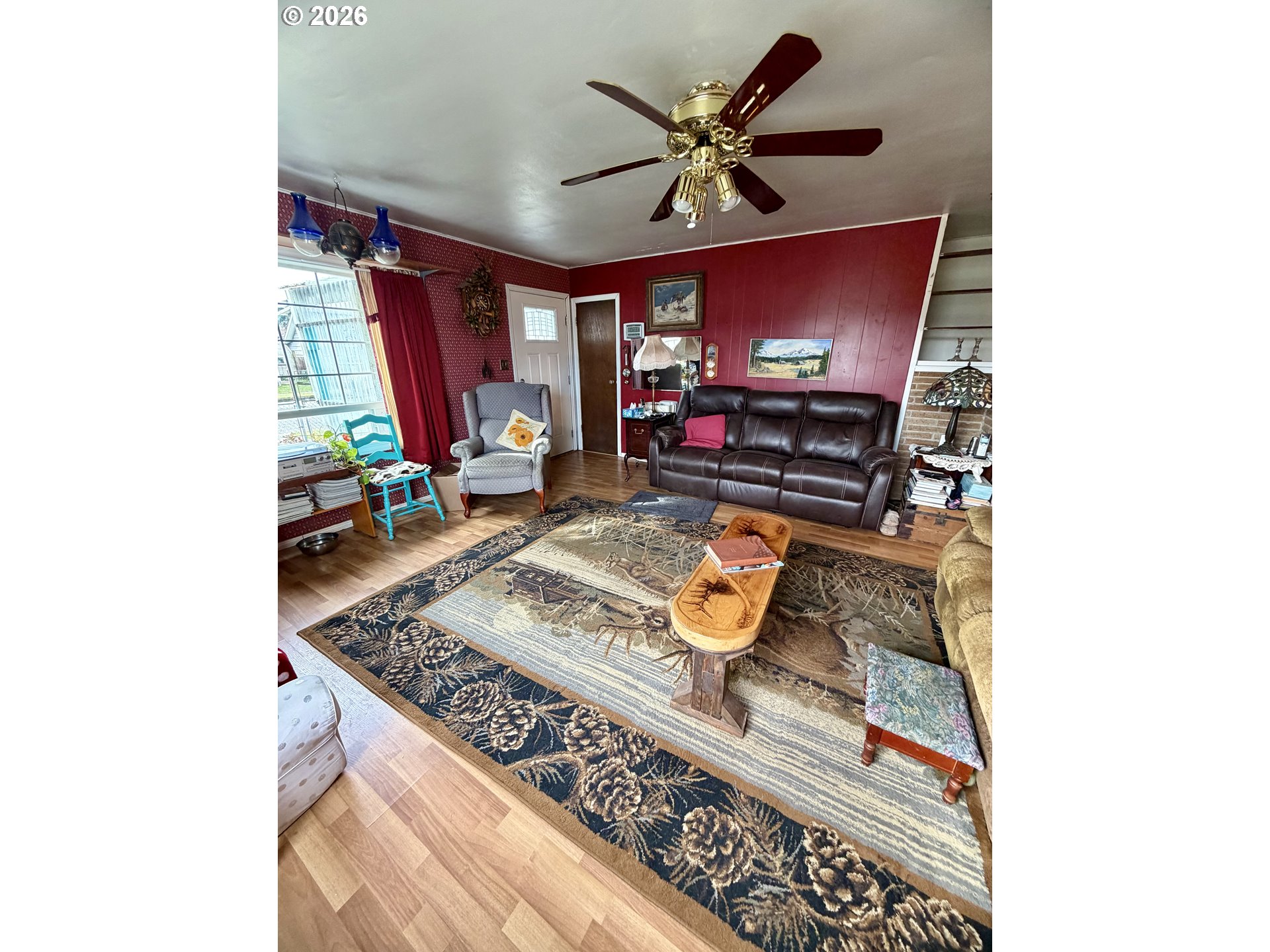 1009 Fir Avenue Reedsport, OR 97467 - Photo 5 of 16 a living room with furniture and a flat screen tv