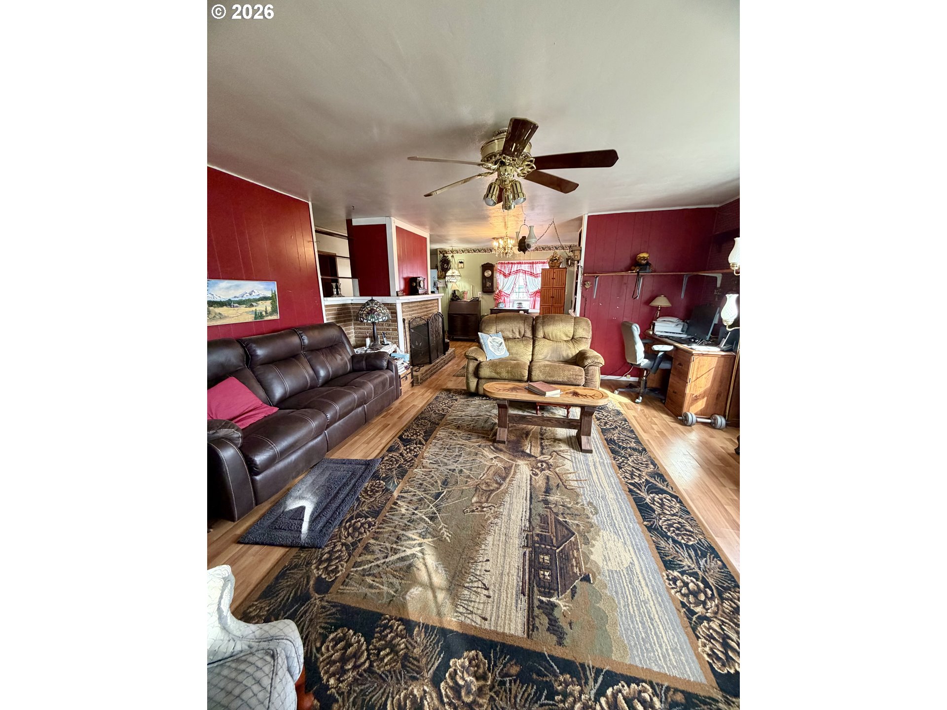 1009 Fir Avenue Reedsport, OR 97467 - Photo 6 of 16 a living room with furniture and a rug