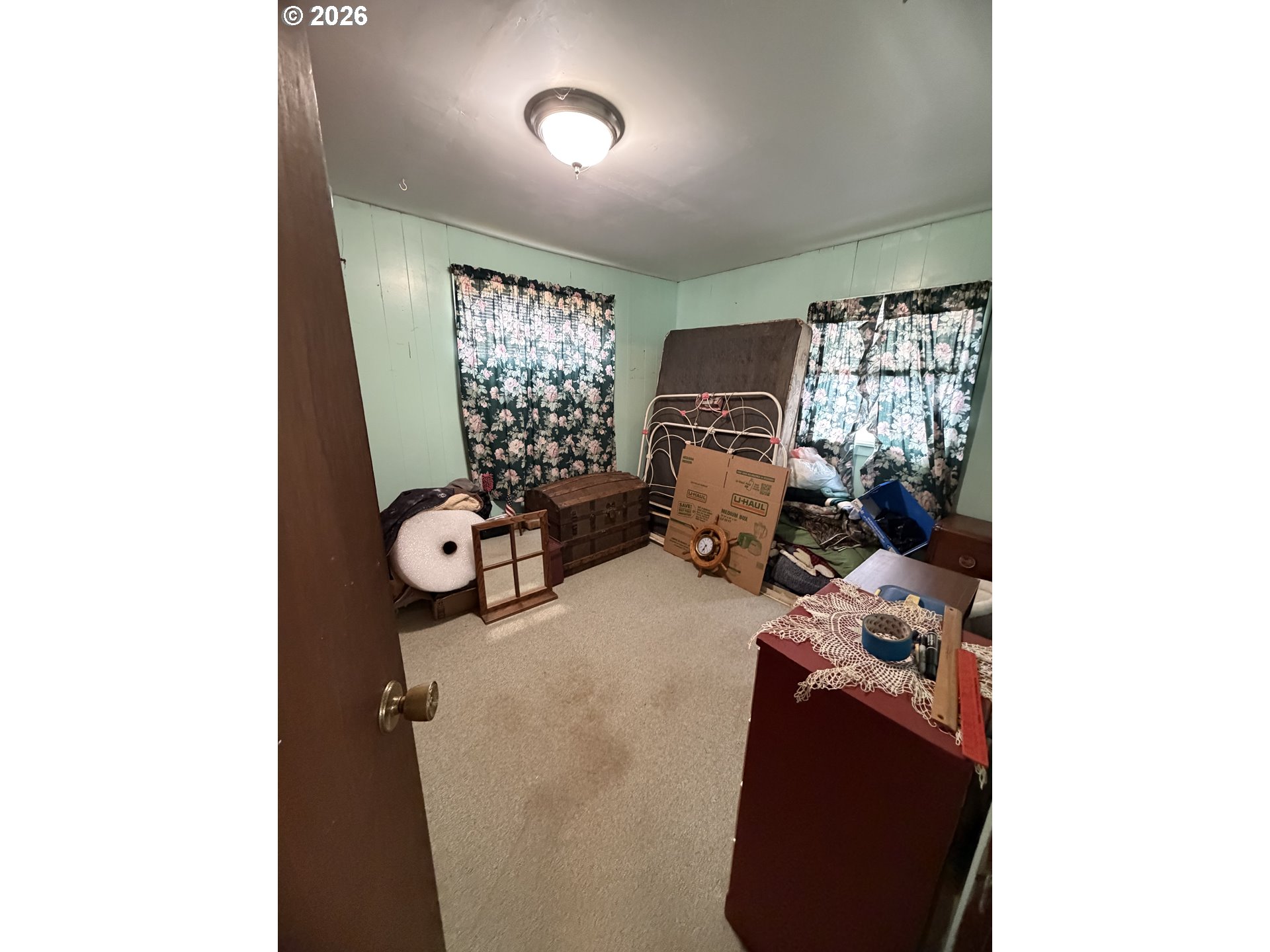 1009 Fir Avenue Reedsport, OR 97467 - Photo 9 of 16 a bedroom with furniture and a window