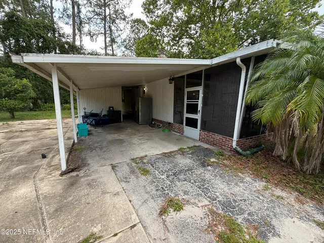 a view of a house with a patio