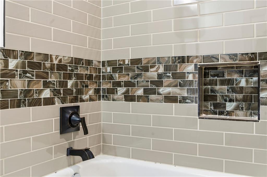 1779 North Olympian Way Southwest Atlanta, GA 30310 - Photo 20 of 48 a bathroom with a shower