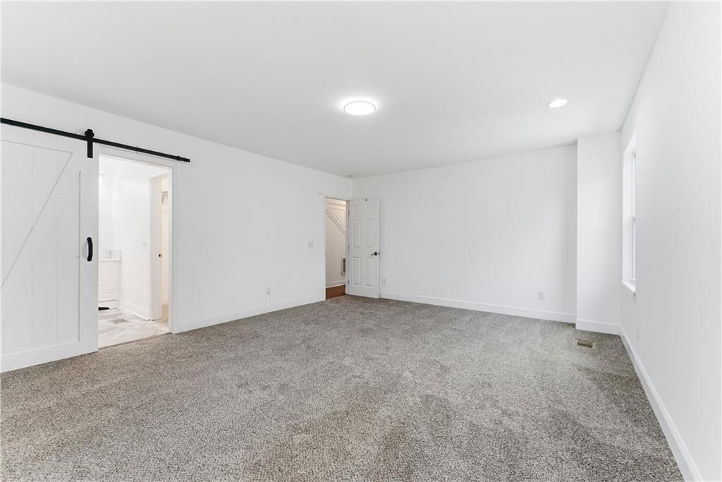 1779 North Olympian Way Southwest Atlanta, GA 30310 - Photo 25 of 48 a view of an empty room