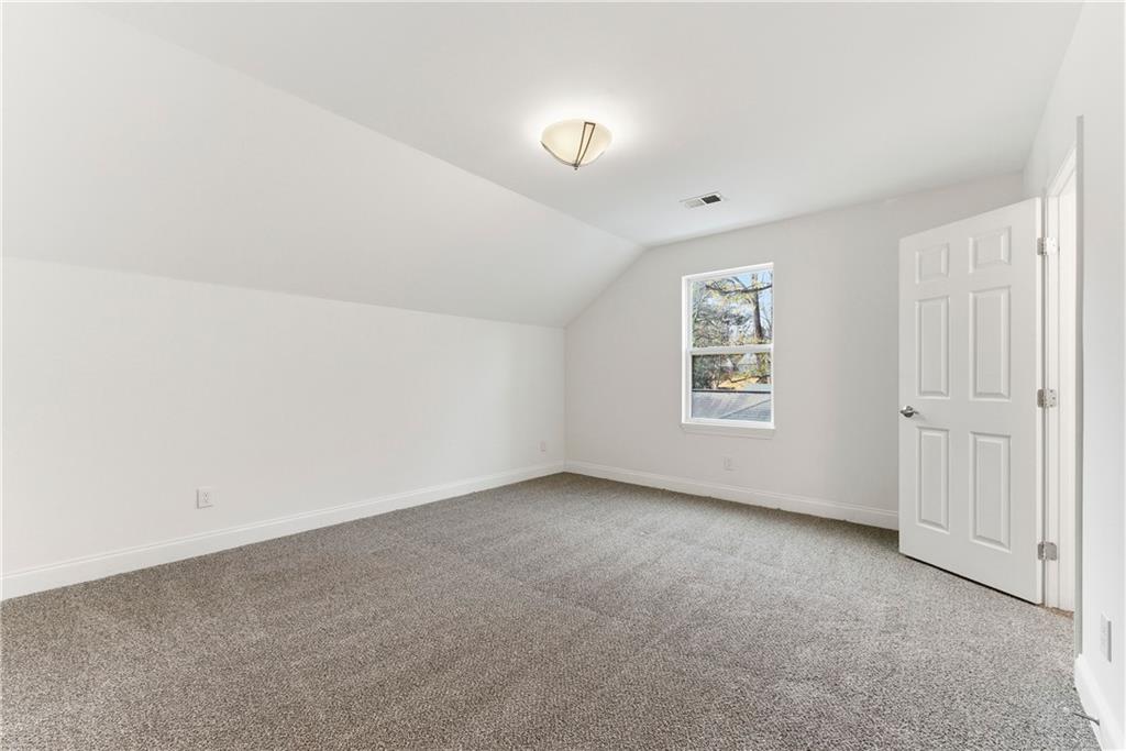 1779 North Olympian Way Southwest Atlanta, GA 30310 - Photo 39 of 48 an empty room with windows