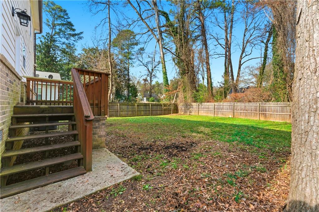 1779 North Olympian Way Southwest Atlanta, GA 30310 - Photo 43 of 48 a view of a house with backyard