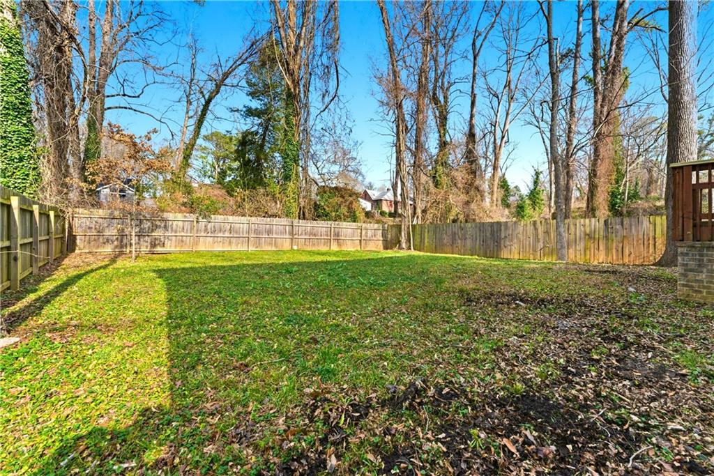 1779 North Olympian Way Southwest Atlanta, GA 30310 - Photo 44 of 48 a view of swimming pool with a big and trees