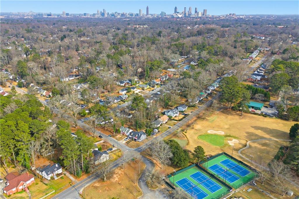 1779 North Olympian Way Southwest Atlanta, GA 30310 - Photo 48 of 48 a view of a city with lush green forest