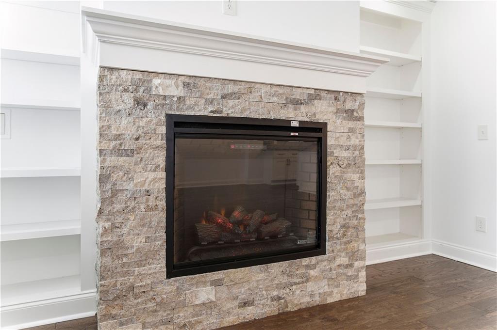 1779 North Olympian Way Southwest Atlanta, GA 30310 - Photo 9 of 48 a close view of a fireplace