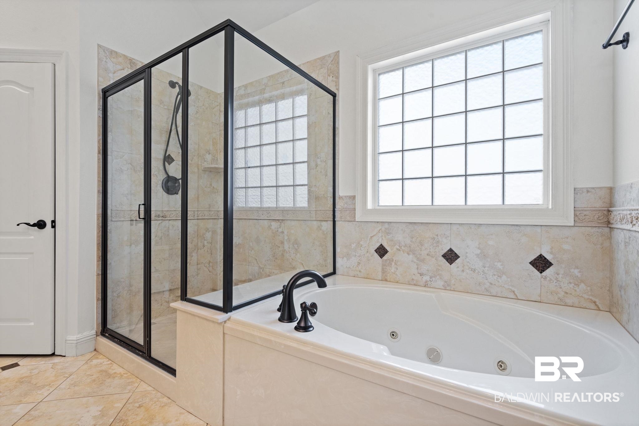 4771 Pecan Ridge East Mobile, AL 36619 - Photo 40 of 48 Bathroom with a tub with jets, a shower stall, and healthy amount of natural light