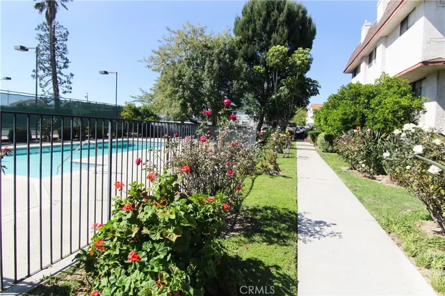 a view of a building and a yard