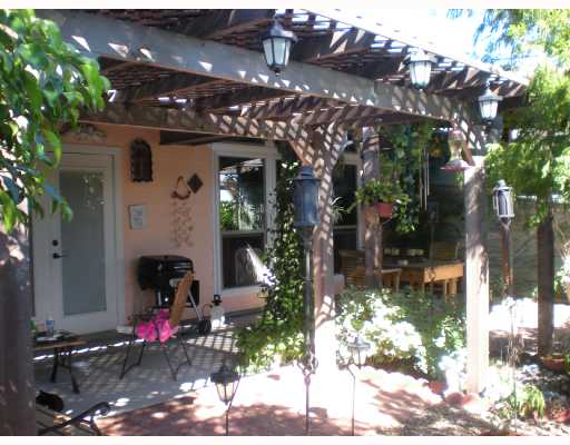 6825 Guinevere Street Corpus Christi, TX 78414 - Photo 9 of 10 a front view of a house with a yard