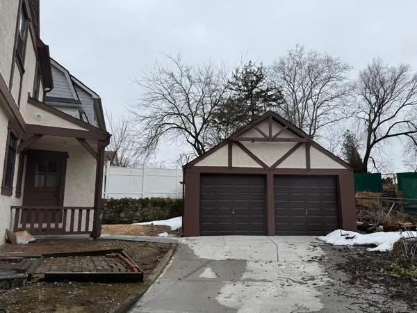 a front view of a house with yard