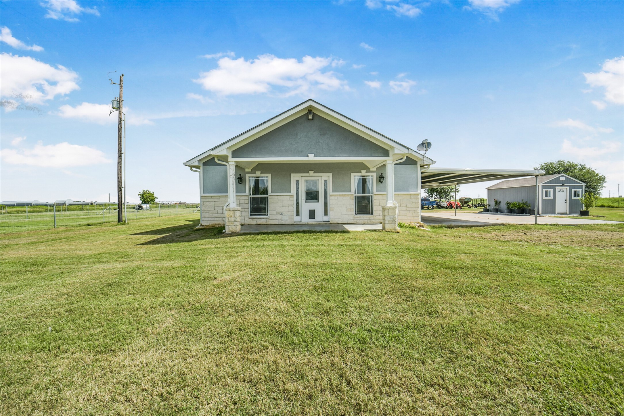 11301 South FM 441 Road El Campo, TX 77437 - Photo 37 of 43 Another view of the front of the main house. Make this 10 acre plot your home today!
