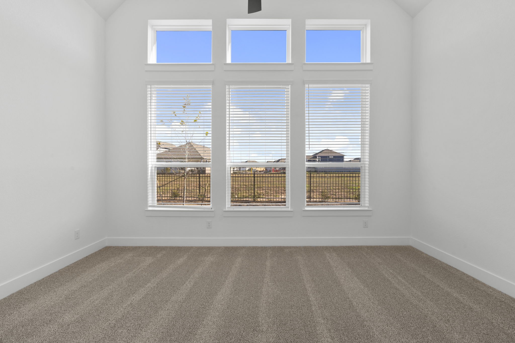 407 Blue River Trail Rosenberg, TX 77471 - Photo 15 of 45 a view of an empty room with a window