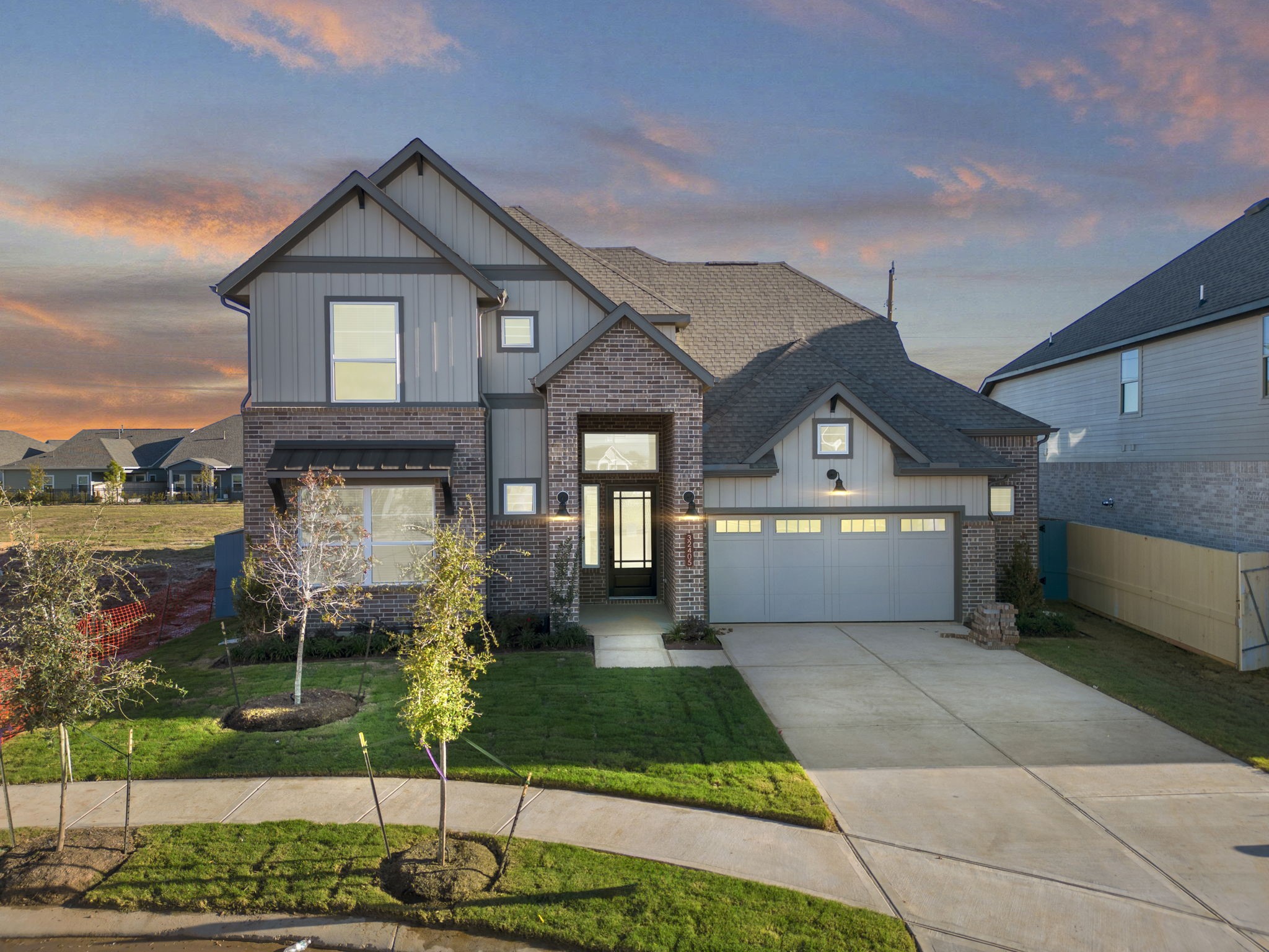 407 Blue River Trail Rosenberg, TX 77471 - Photo 2 of 45 a front view of a house with a yard and garage