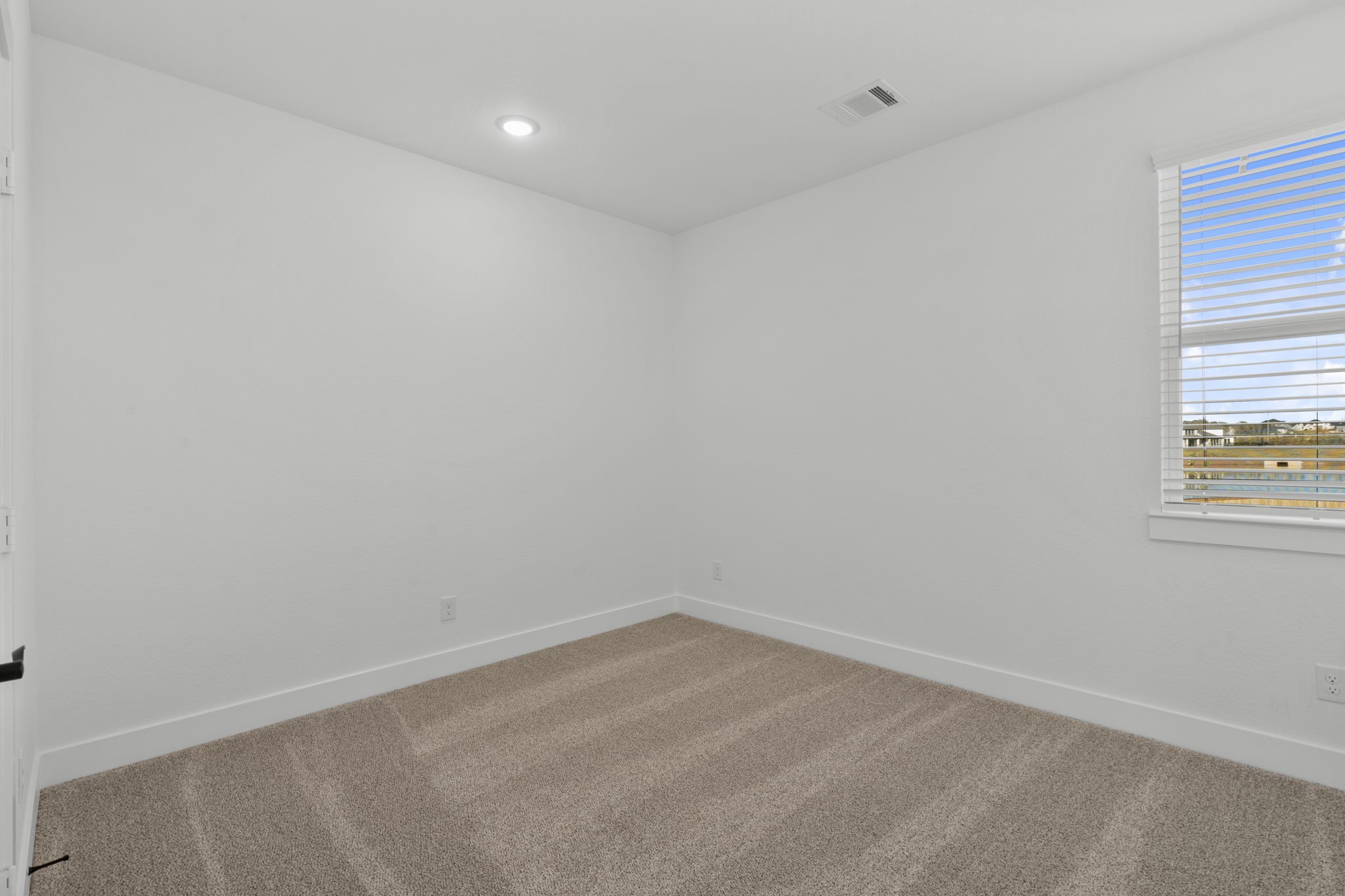 407 Blue River Trail Rosenberg, TX 77471 - Photo 35 of 45 an empty room with a window