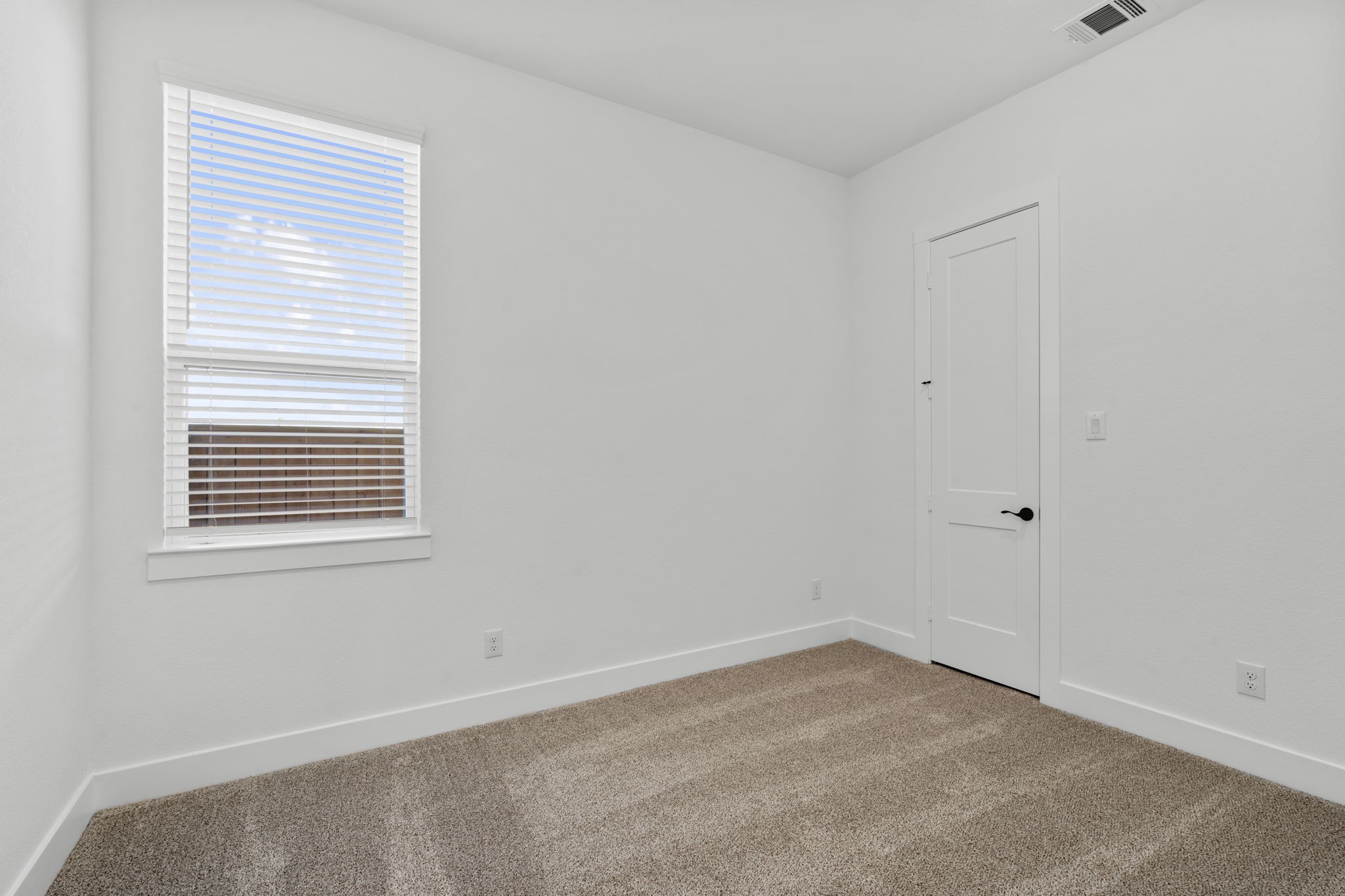 407 Blue River Trail Rosenberg, TX 77471 - Photo 6 of 45 a view of an empty room with a window
