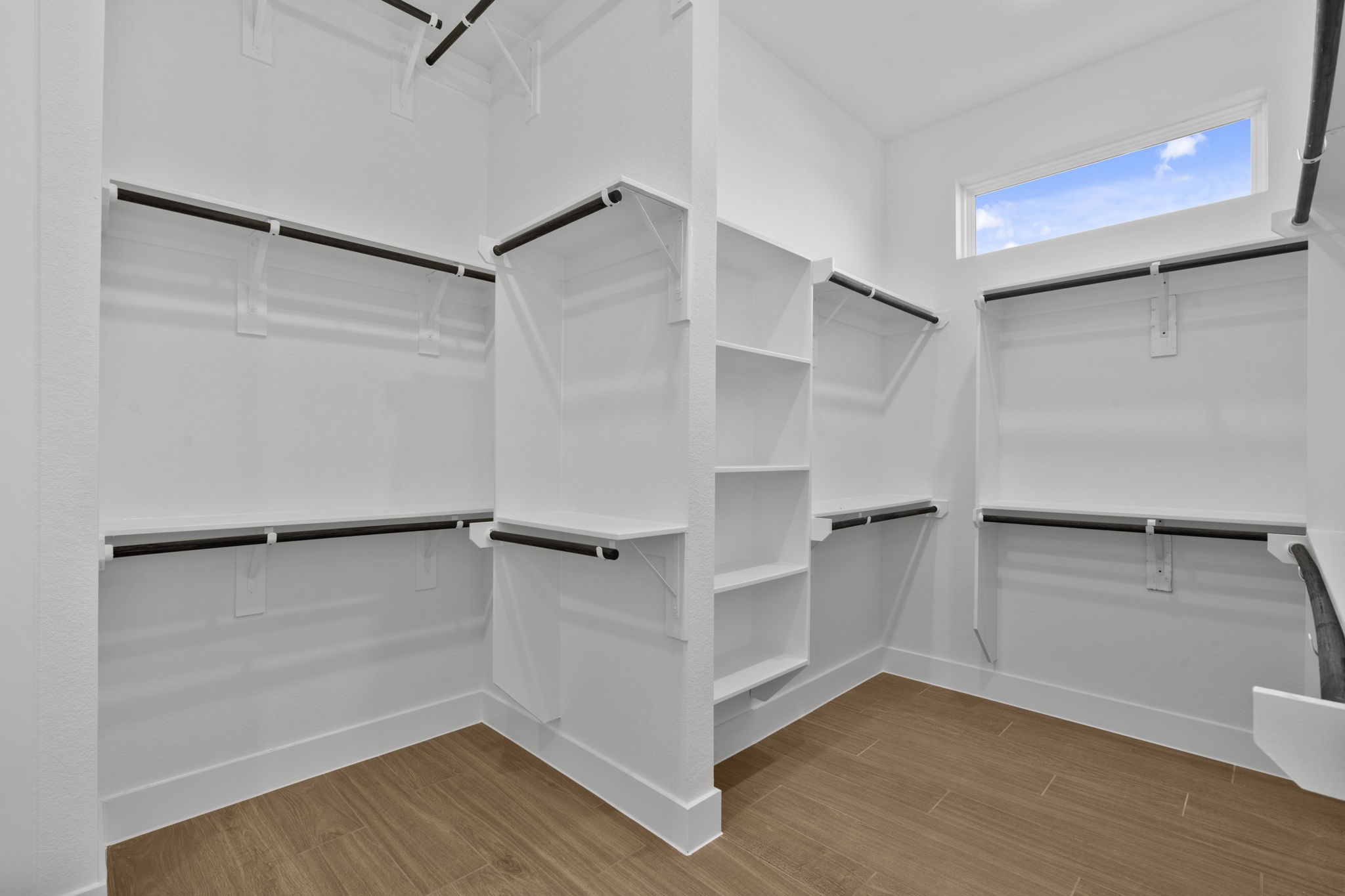 407 Blue River Trail Rosenberg, TX 77471 - Photo 10 of 45 a view of an empty walk in closet