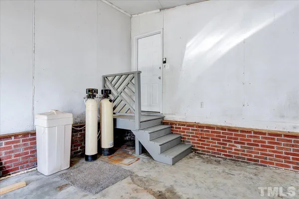 a view of stairs and an empty room