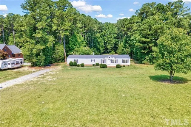 a view of a backyard with a garden