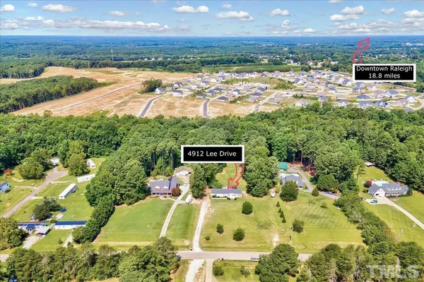 a view of a swimming pool with an outdoor space and seating area